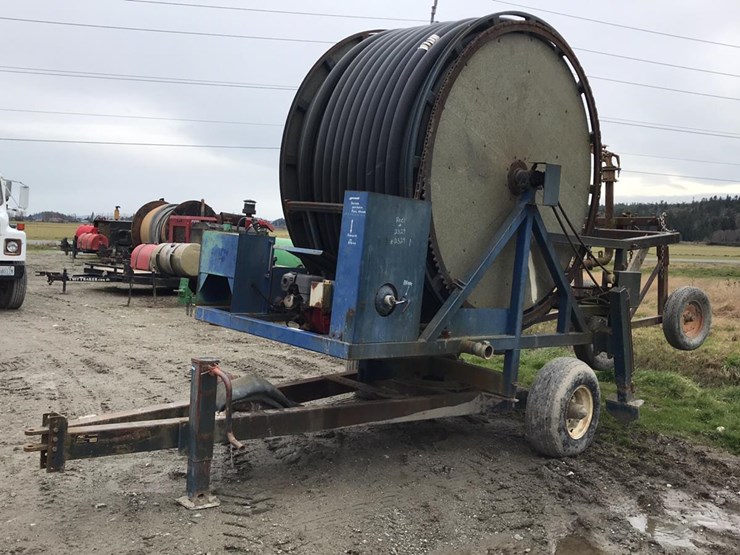 Evergreen Irrigation Reel Lot 9207, Online Only Farm and Processing