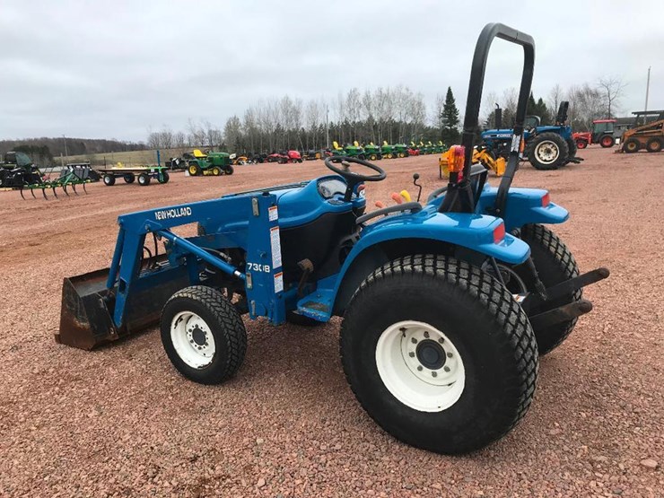 1998 New Holland 7308 Lot 102, RIESTERER & SCHNELL 21ST ANNUAL LAWN & GARDEN EQUIPMENT