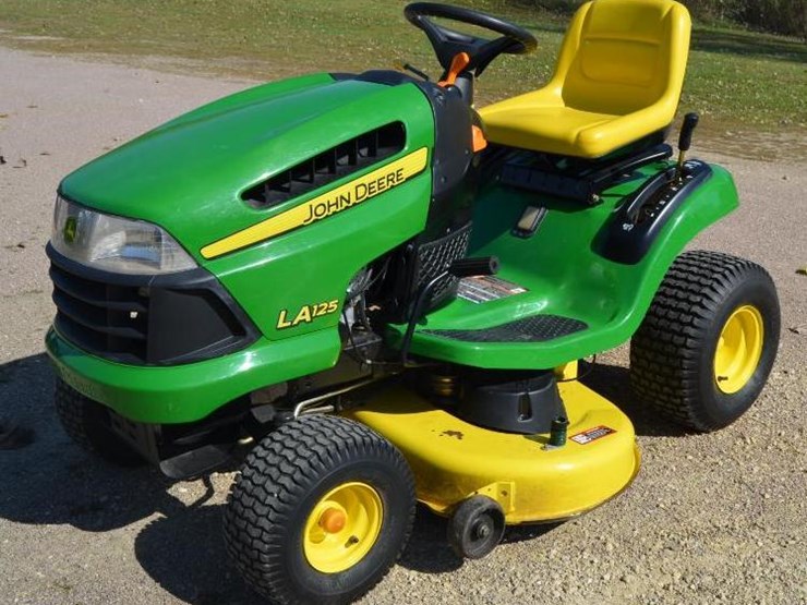 John Deere LA125 Lot 660, 1948 8N Ford Tractor, 2008 Subaru Outback
