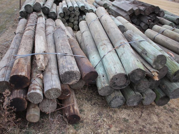 (2) BUNDLES OF LARGE TREATED WOODEN FENCE POSTS Lot 2581, January