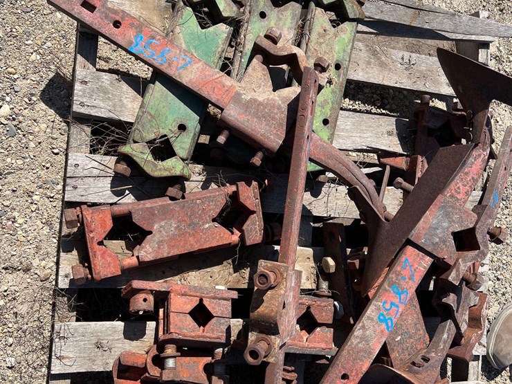 858 • assorted cultivator shanks clamps and bar spacers Lot 858