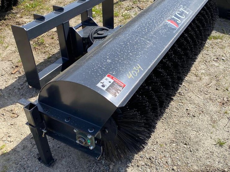 Unused 72IN JCT Skid Steer Angle Broom Attachment Lot 4034, APRIL