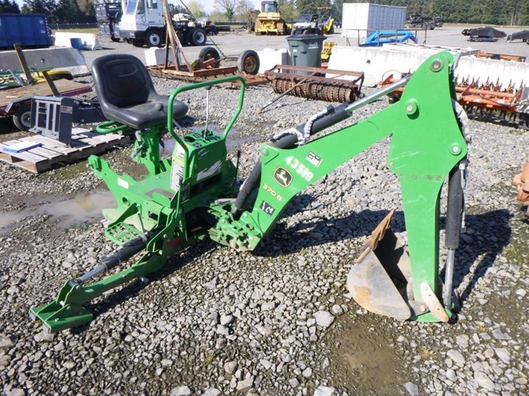 John Deere 370B Backhoe Attachment Lot 244, Monthly Public Auction