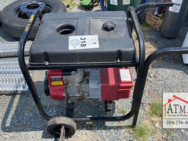 10 HP Coleman Generator Lot 318, Equipment Auction Ring 1, 7/23/2022