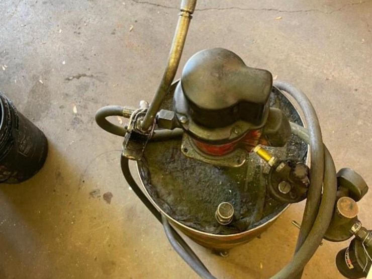 Grease barrel with pump Lot 431, QUINN EXCAVATING AND PAVING AUCTION