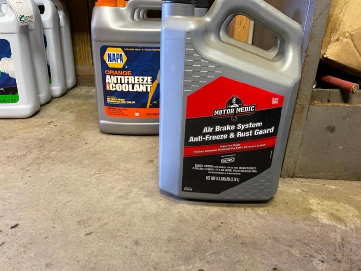 Air brake antifreeze and NAPA orange antifreeze & coolant Lot 560
