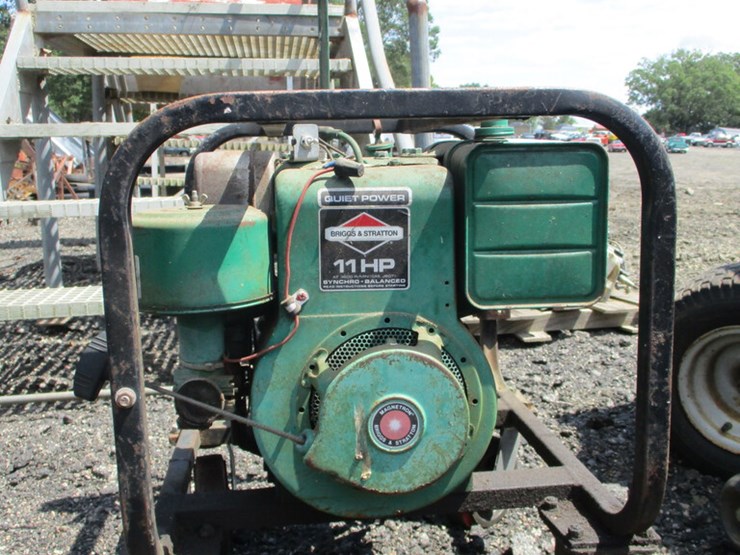 Coleman Powermate 11hp Generator Lot 787, Traditions Auction Co LLC