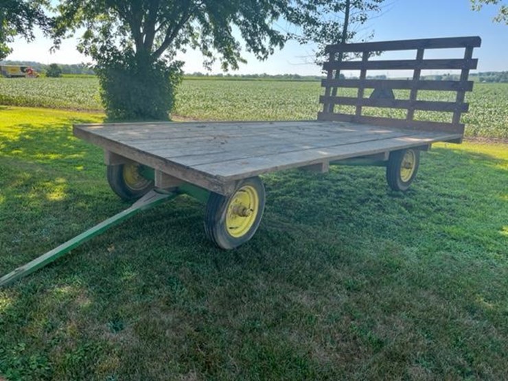 4059 • Flatbed Hay Wagon Lot 4059, K. Roger Gilbert John Deere