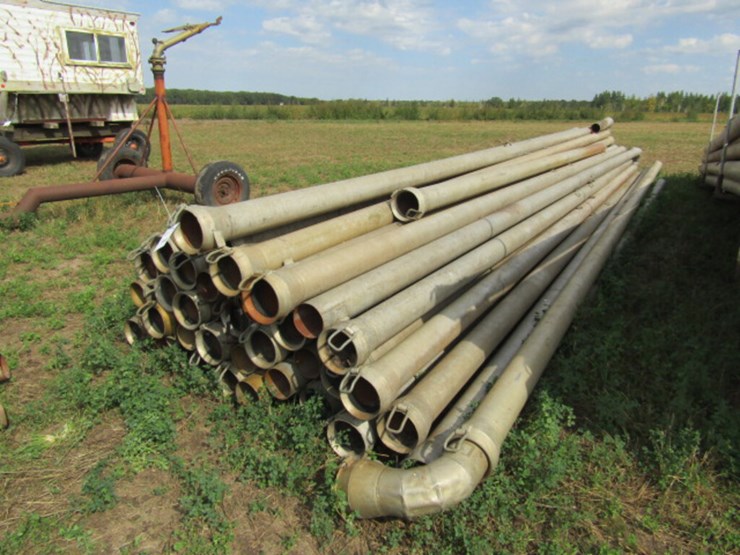 1692. Pile of Mostly 6 Inch X 30 FT. Hook & Latch Irrigation Pipe