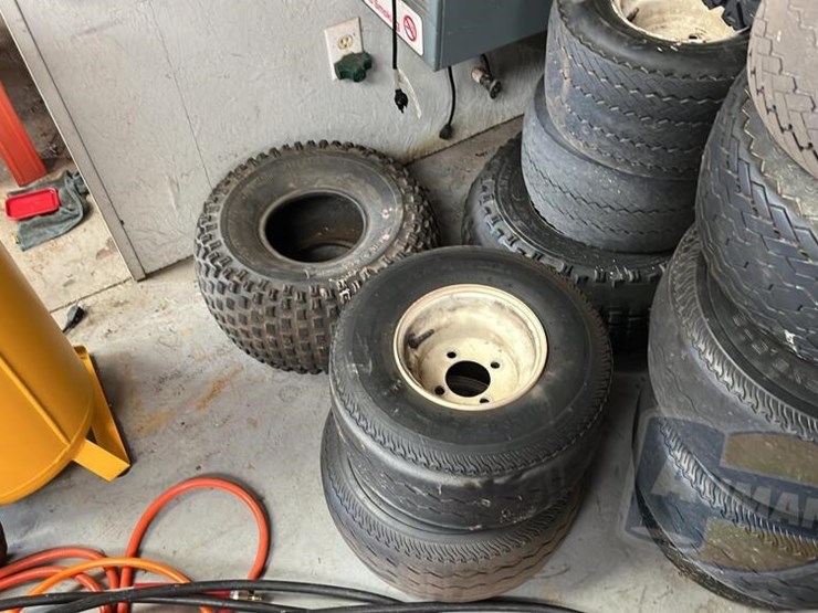 Large Stack of Tires Lot 3111, Stew Paquette IH Museum Implements