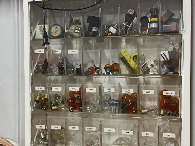 2004 • Wall display of PDQ car accessories Lot 2004, Meadow Bridge