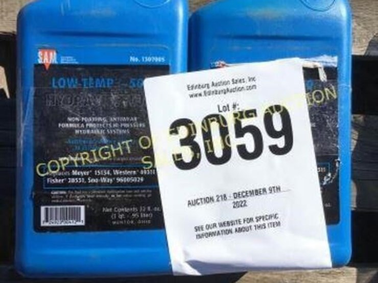 E. (4) new low temp hydraulic fluid bottles Lot 3059, FRIDAY, DEC