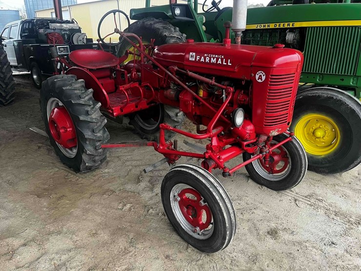 Super A Farmall Tractor with Cultivator. This lot is located at 6088 US