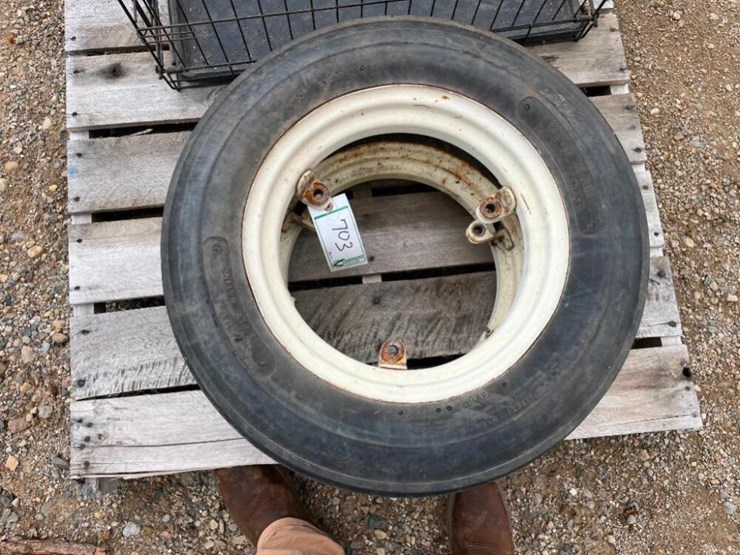 Farmall front tires and rims Lot 703, MAY CONSIGNMENT AUCTION, 5/16