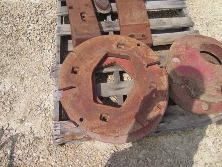 5475 • Pair of Farmall Tractor Wheel Weights Lot 5475, Paul Marty