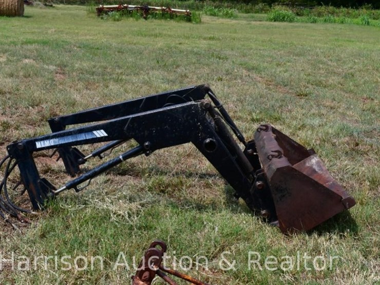 MEMO FRONT END LOADER Lot 564, Fall Consignment Auction, 10/1/2023